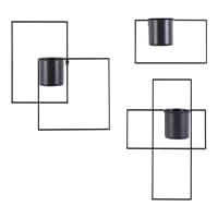 Drei geometrische Pflanztöpfe aus schwarzem Metall.