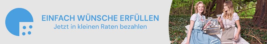 EINFACH WÜNSCHE ERFÜLLEN – Jetzt in kleinen Raten bezahlen. Zwei Frauen sitzen im Wald auf einer Decke mit Geschenken.