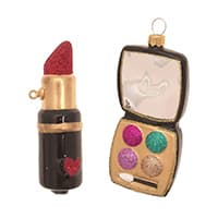 Schwarzer Lippenstift mit rotem Herz und Lidschattenpalette mit vier Farben und Spiegel