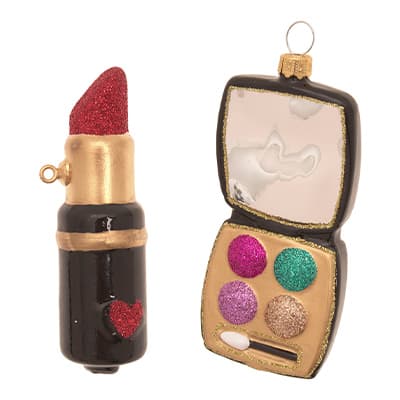 Schmuckanhänger in Form von rotem Glitzerlippenstift und Lidschattenpalette mit vier Farben und Spiegel