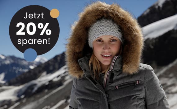 Jetzt 20% sparen! – Person in grauer Winterjacke mit Fellkapuze, Hintergrund Schneebedeckte Berge.