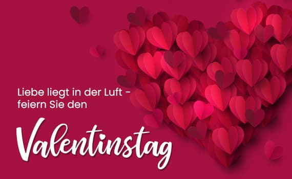 Liebe liegt in der Luft – feiern Sie den Valentinstag. Herz aus roten Papierherzen vor rotem Hintergrund.